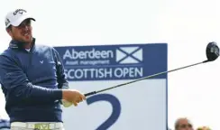  ??  ?? 0 Marc Warren watches his tee shot sail down the fairway during the 2015 Scottish Open at Gullane. He recovered well from a nasty spot in a fairway bunker (main picture) on his way to a fourth-place finish.