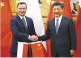  ??  ?? BEIJING: Poland’s President Andrzej Duda (left) and his Chinese counterpar­t Xi Jinping shake hands after a signing ceremony following their meeting at the Great Hall of the People in Beijing yesterday.