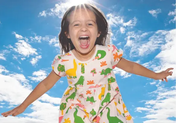  ?? Picture: David Caird ?? During a record-breaking Victorian summer, Camila, 4, is determined to catch some rays at the beach.