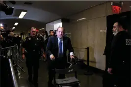  ?? DESIREE RIOS — THE NEW YORK TIMES ?? Film producer Harvey Weinstein uses a walker while arriving at State Supreme Court in Manhattan for his rape and sexual assault trial in 2020.