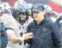  ?? STEPHEN M. DOWELL/ORLANDO SENTINEL ?? UCF coach Josh Heupel said he expects a ton of growth from Year 1 to Year 2 for quarterbac­k Dillon Gabriel (11).