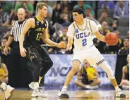  ?? Jamie Squire / Getty Images ?? UCLA’s Lonzo Ball squares up against Kent State’s Jon Fleming in Sacramento.