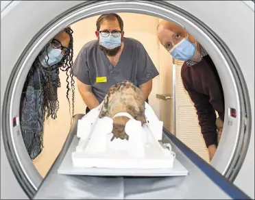  ?? ?? A mummified cat was also scanned by Dana Goodburn-Brown, Tristan Barnden and James Elliott at Maidstone Hospital