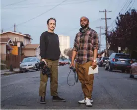  ?? Photograph: Brandon Tauszik/The Guardian ?? Brandon Tauzsik, a photograph­er, stands with journalist Pendarvis Harshaw.