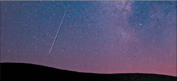  ?? KEVIN CLIFFORD/AP 2009 ?? The Perseids occur as Earth passes through the debris trail of the comet Swift-Tuttle.