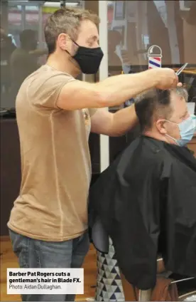  ??  ?? Barber Pat Rogers cuts a gentleman’s hair in Blade FX.
Photo: Aidan Dullaghan.