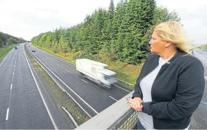  ?? Picture: Dougie Nicolson. ?? Councillor Lea McLelland looking over the traffic on the A92.