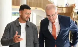  ??  ?? Australian prime minister Scott Morrison and singer Guy Sebastian at the art rescue package announceme­nt in June 2020. Photograph: Joel Carrett/AAP