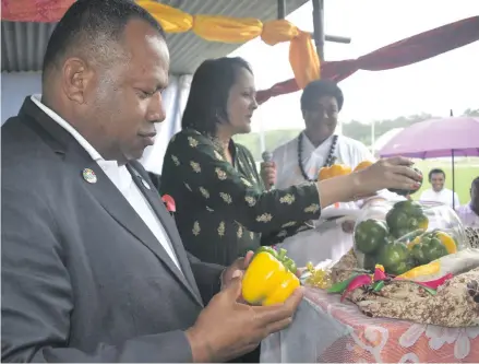  ?? Photo: Mereleki Nai ?? From left; Minister for Agricultur­e Inia Seruiratu, Minister for Health and Medical Services Rosy Akbar and Ateca Kama after launching the new capsicum variety during the World Food Day celebratio­ns at Lawaqa Park in Sigatoka on October 17, 2018.