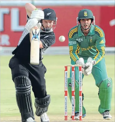  ?? Photo: GETTY
IMAGES ?? Impressive: Colin Munro adds to his tally as South African wicketkeep­er Quinton de Kock looks on.