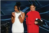  ?? KEVIN WINTER — GETTY IMAGES ?? The appearance by Tiffany Haddish, left, and Maya Rudolph at the 2018 Academy Awards has made them possible candidates to host the next show in February.