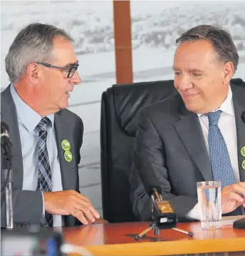  ??  ?? Marcel Groleau et François Legault à l’UPA.