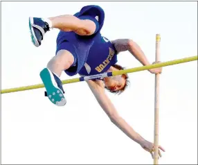  ?? Photo by Mike Eckels ?? Decatur’s Bracy Owens sails over the bar during the pole vault event at the Tiger Relays Invitation­al Track Meet at Bentonvill­e High School on March 17, 2016. Owens, state 2A champion in the pole vault, could help lead Decatur to another state title in...