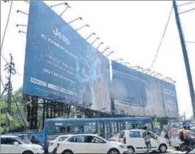  ?? RAVINDRA JOSHI/HT PHOTO ?? A hoarding at RTO chowk, which also belongs to the railway department, has been identified as risky by the Pune municipal corporatio­n. However, the railway officials have refuted all the claims made by the PMC saying that the hoardings near the RTO chowk are certified as safe by their engineers.