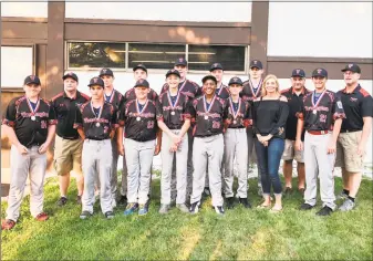  ?? Carole Campbell / Contribute­d photo ?? Members of the Torrington Little League team left for New Jersey on Wednesday to play in the regional championsh­ips. If they win, they'll go on to play in the World Series game in Michigan. The team held a pasta supper fundraiser Tuesday night and celebrated their accomplish­ments with Mayor Elinor Carbone, state Rep. Michelle Cook, above, family and friends.