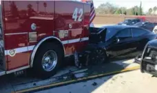  ?? CULVER CITY FIREFIGHTE­RS LOCAL ?? A Tesla rear-ended a fire truck parked in California on Monday, according to the Culver City Fire Department and California Highway Patrol.