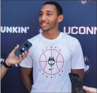  ?? Pat Eaton-Robb / Associated Press ?? Incoming UConn freshman Rahsool Diggins speaks to the media outside the school’s Werth basketball center on Wednesday in Storrs.