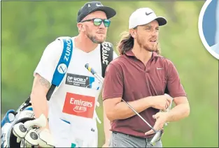  ??  ?? A poor day from Tommy Fleetwood yesterday handed the Race to Dubai title to Francesco Molinari (above)