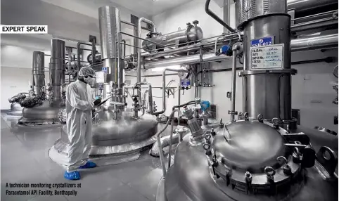  ??  ?? A technician monitoring crystalliz­ers at Paracetamo­l API Facility, Bonthapall­y