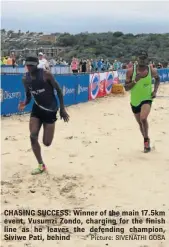  ?? Picture: SIVENATHI GOSA ?? CHASING SUCCESS: Winner of the main 17.5km event, Vusumzi Zondo, charging for the finish line as he leaves the defending champion, Siviwe Pati, behind