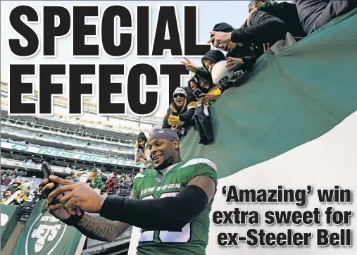  ?? Getty Images ?? Le’Veon Bell, who finished with 72 yards rushing and 21 yards receiving, takes a selfie with Jets and Steelers fans after Gang Green’s 16-10 victory over Pittsburgh, the running back’s former team.