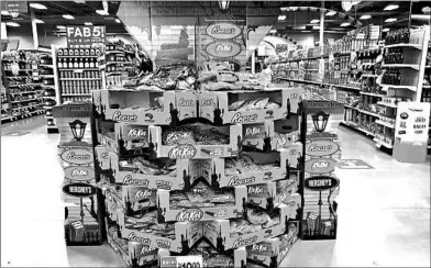  ?? ROBERT F. BUKATY/AP ?? Halloween candy is displayed at a store Wednesday in Freeport, Maine. Earlier Halloween displays likely helped boost sales.