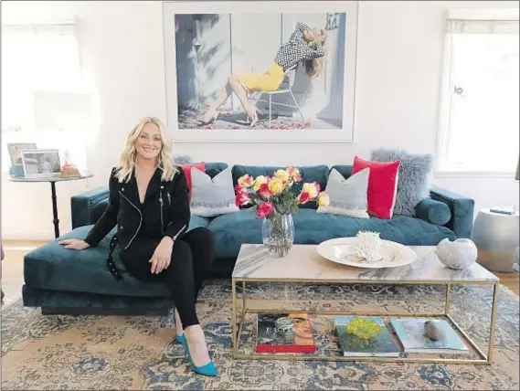  ?? Myung J. Chun Los Angeles Times ?? ELISABETH RÖHM wants guests to “feel at home in the barefooted-ness of it all,” and that includes tracking sand inside.