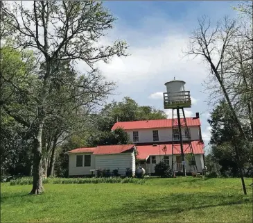  ?? CONTRIBUTE­D BY ANDALUSIA FOUNDATION ?? The Baldwin County farmhouse that was Flannery O’Connor’s last home had many outbuildin­gs. Not all have survived.