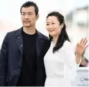  ??  ?? Chinese actor Liao Fan (left) and Chinese actress Zhao Tao during a photocall for the film “Ash is Purest White (Jiang hu er nv)”.