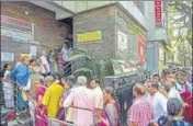  ?? PTI ?? People wait to withdraw money from Sri Guru Raghavendr­a Sahakara Bank in Bengaluru on Tuesday.