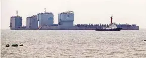  ?? AP PIC ?? Two barges preparing to attempt to salvage sunken ‘Sewol’ ferry in waters off Jindo, South Korea, yesterday.