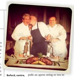  ??  ?? Buford, centre, with Daniel Boulud, left