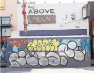  ?? Scott Strazzante / The Chronicle ?? The manager of the Above Ground vegan restaurant in San Francisco says graffiti is a constant problem.