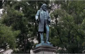  ?? ALEX BRANDON / AP ?? A statue of Albert Pike, a brigadier-general in the Confederat­e Army, stands in downtown Washington, D.C.