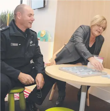  ?? Picture: ALISON WYND ?? ELEPHANT IN THE ROOM: Superinten­dent Craig Gillard and Police Minister Lisa Neville at the official opening of the refurbishe­d Barwon Multi-Disciplina­ry Centre yesterday. It is believed to be the first time the pair have appeared together publicly...