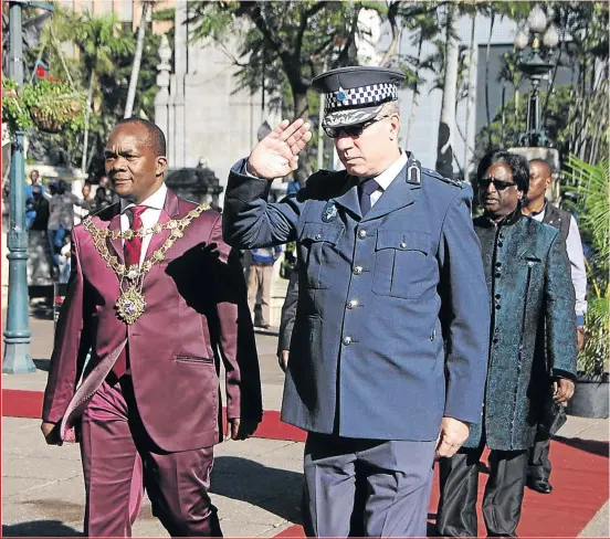  ?? PHOTO: PHUMLANI THABETHE ?? eThekwini municipali­ty mayor James Nxumalo arrives at the city hall in Durban to deliver his last municipali­ty budget speech yesterday. Walking behind is eThekwini speaker Logie Naidoo