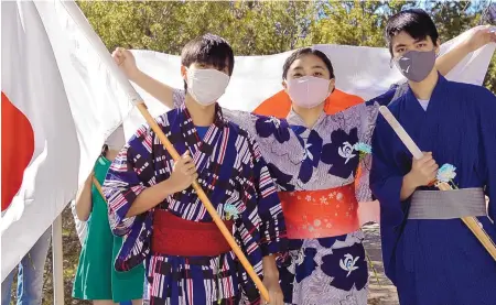  ?? GWEN ALBERS/UNITED WORLD COLLEGE-USA ?? Kita Ueno, left, Tae Sakazaki, center, and Taisei Yokoshima, all from Japan, participat­e in the annual Welcome Ceremony at the United World College-USA.