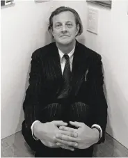  ?? Fred R. Conrad / New York Times 1989 ?? Esteemed graphic designer Ivan Chermayeff beneath displays of art in 1989.