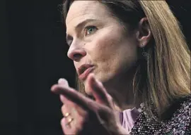  ?? AMY CONEY BARRETT Andrew Caballero- Reynolds Pool Photo ?? has described herself as “an originalis­t” who would follow the approach taken by her former boss, the late Justice Antonin Scalia.