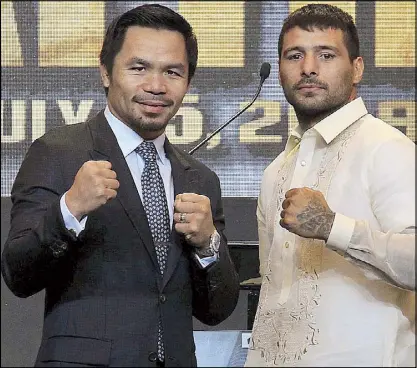  ?? JUN MENDOZA ?? Boxing icon Sen. Manny Pacquiao poses with WBA welterweig­ht champion Lucas Matthysse to promote their July 15 title fight in Kuala Lumpur during a news conference at the City of Dreams in Parañaque City yesterday.