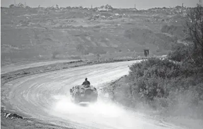  ?? GETTY IMAGES ?? An Israeli army vehicle moves toward the Gaza Strip on Monday in southern Israel, Israel. Israel’s allies, including the UK and US, have urged the country to avoid escalation of conflict with Iran.