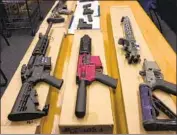  ?? Haven Daley Associated Press ?? “GHOST” GUNS can now be seized by police from someone who’s been “red-f lagged” by a judge.