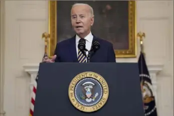  ?? Evan Vucci/Associated Press ?? President Joe Biden delivers remarks on the Emergency National Security Supplement­al Appropriat­ions Act on Tuesday in the State Dining Room of the White House.