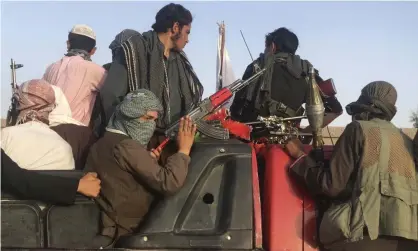  ??  ?? A 40-strong group of Taliban fighters were looking for Qamar Gul’s father. Photograph: Rahmat Gul/AP