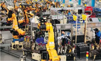  ?? THE ASSOCIATED PRESS ?? A recent analysis by the Business Council of B.C. suggests 42 per cent of workers in the province are employed in jobs with “a high probabilit­y of being automated,” concentrat­ed in three sectors.