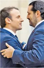  ?? BILD: SN/APA ?? Emmanuel Macron begrüßte Saad Hariri im Élysée-Palast.