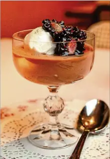  ?? STYLING BY JEB ALDRICH / CONTRIBUTE­D BY CHRIS HUNT PHOTOGRAPH­Y ?? Dark Chocolate Champagne Pot de Crème with Vanilla Chantilly and Macerated Blackberri­es.