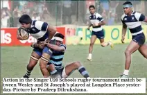  ??  ?? Action in the Singer U20 Schools rugby tournament match between Wesley and St Joseph’s played at Longden Place yesterday.-Picture by Pradeep Dilrukshan­a.