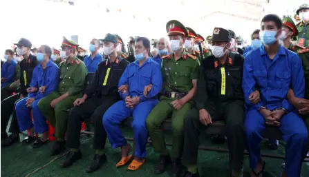  ?? — AFP file photo ?? Photo shows defendants sitting during their trial in Vietnam’s Dak Lak province.