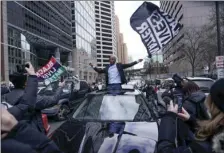  ?? AP PHOTO/MORRY GASH ?? People rally outside the courthouse in Minneapoli­s on April 20, after the guilty verdicts were announced in the trial of former Minneapoli­s police officer Derek Chauvin in the death of George Floyd.